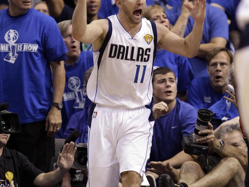 Dallas Mavericks' Jose Juan Barea reacts during the second half of Game 3 of the NBA Finals basketball game against the Miami Heat Sunday, June 5, 2011, in Dallas.