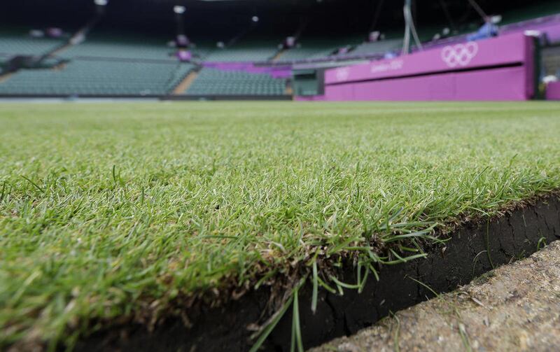 Grass is seen at Centre Court at the All England Lawn Tennis Club at Wimbledon, London Friday, July 27, 2012. On Saturday, lawn tennis will be played in the Olympics for the first time since 1920. The Games will be staged at the All England Club only thre