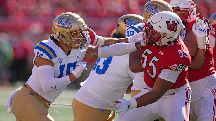 Utah offensive lineman Spencer Fano (55) battles UCLA's Laiatu Latu during game, Saturday, Sept. 23, 2023, in Salt Lake City.