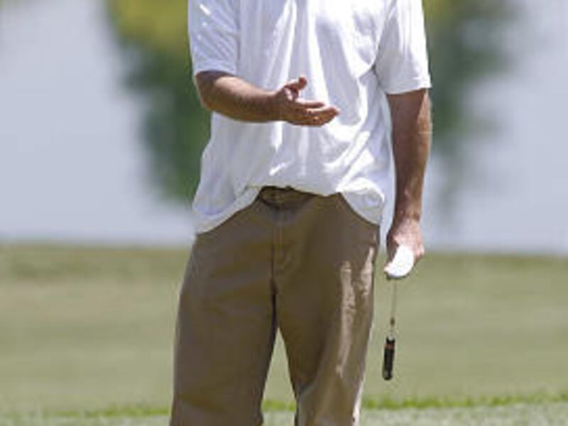 John Owen tries to will his ball to the left but it won't drop for him on No. 9 on the Soldier Hollow Silver Course.