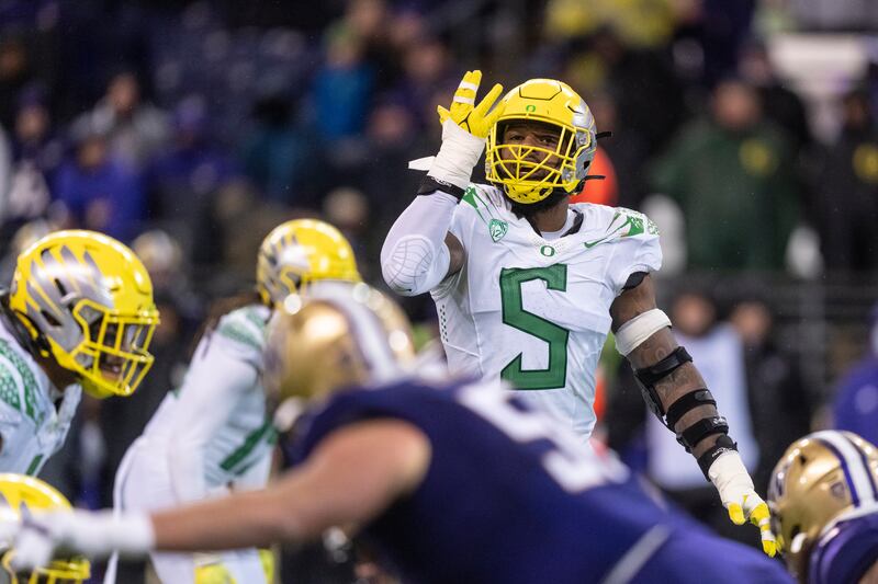 Oregon defensive end Kayvon Thibodeaux gestures before a play during game against Washington, Nov. 6, 2021, in Seattle.