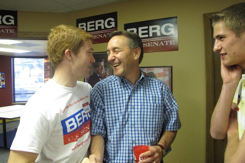 U.S. Rep. Rick Berg, R-Fargo, shakes hands with supporter Nate Todd Tuesday night, June 12, 2012 during a reception at Berg's Fargo headquarters for the primary election. Berg was favored to beat Duane Sand for the Republican nomination for U.S. Senate.
