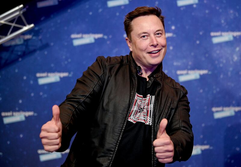 SpaceX owner and Tesla CEO Elon Musk arrives on the red carpet for the Axel Springer media award, in Berlin, Germany.