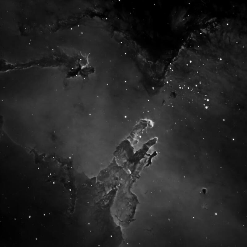 Several exposures of the Eagle Nebula were taken through hydrogen-alpha filters, which pass only the narrow wavelengths of light emitted by glowing hydrogen gas. Such images bring out features that may be obscured in photos taken with the usual clear, red