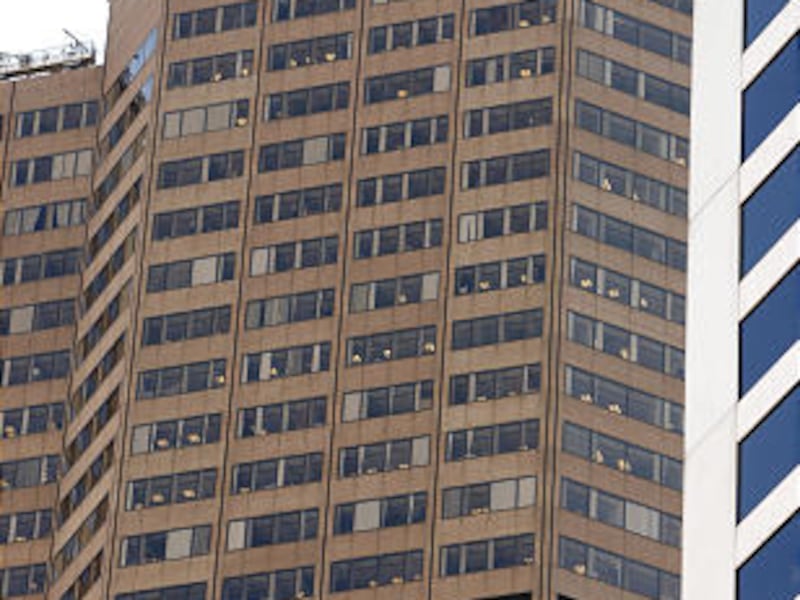 The Qwest Communications tower is shown in downtown Denver. CenturyTel Inc. said Thursday that it will buy Qwest Communications International Inc. in a stock swap worth $10.6 billion, creating a telecommunications giant serving customers in 37 states.