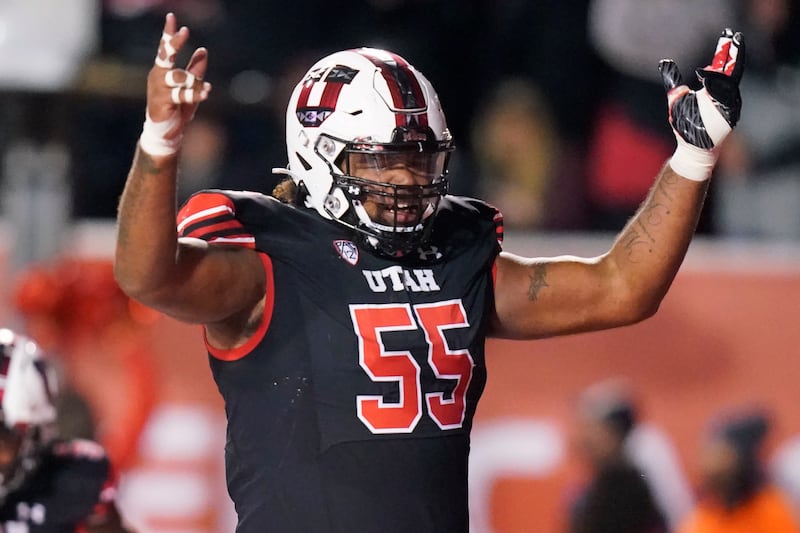 Utah offensive lineman Nick Ford celebrates a Utah touchdown against Arizona State, Oct. 16, 2021, in Salt Lake City.