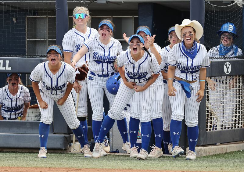 Bingham players cheer on the play against Herriman in the 6A softball state championship in Provo on Friday, May 26, 2023.