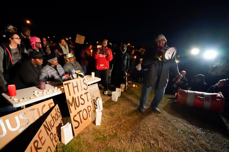 Rev. Andre E Johnson, of the Gifts of Life Ministries, preaches at a candlelight vigil for Tyre Nichols.