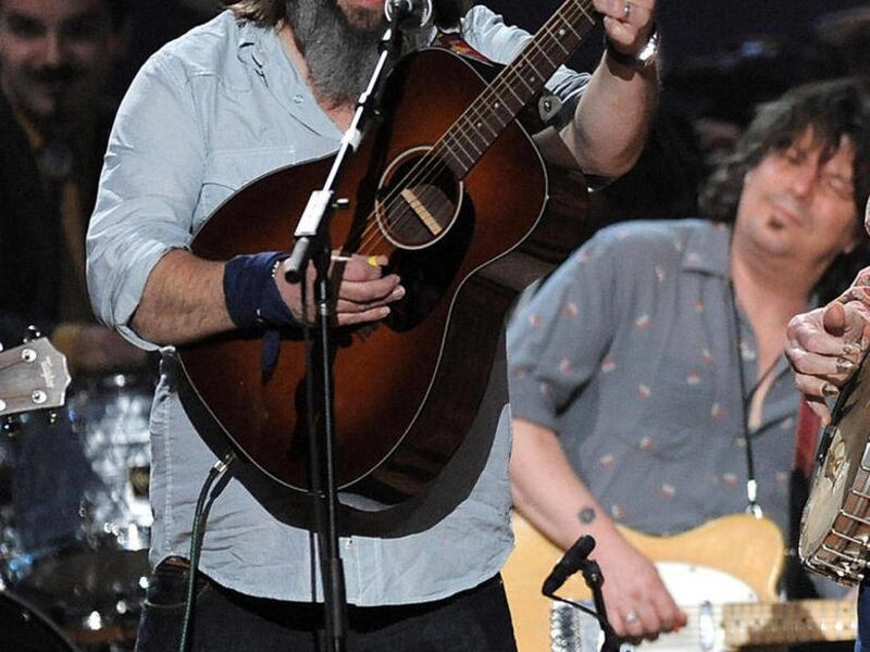 FILE - In this May 3, 2009 file photo, musician Steve Earle performs at a benefit concert celebrating Pete Seeger's 90th birthday at Madison Square Garden in New York. Earle has released a CD and his debut novel with the same titles, "I'll Never Get Out o