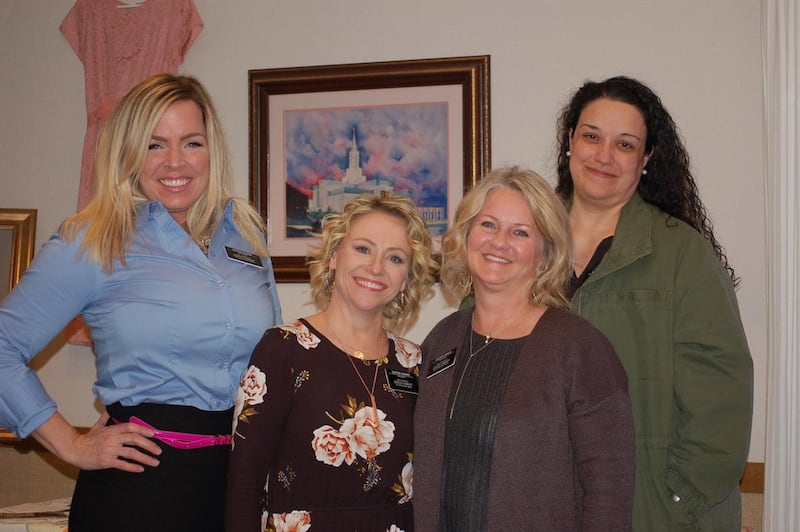 FamilySearch missionaries who do a presentation as "Grandma's Syrup," Risa Baker, left, Rhonna Farrer, Crystal Farish, Allison Kimball, talked to a Relief Society group before RootsTech began.