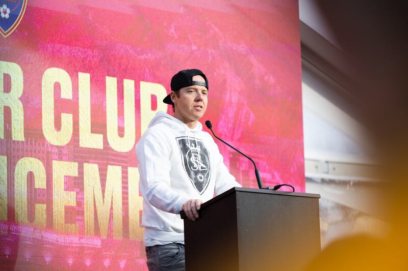 Ryan Smith speaks during a news conference announcing the return of the National Women’s Soccer League team.