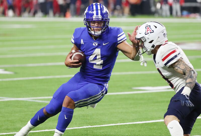 BYU running back Lopini Katoa scores on a two-point conversion during Vegas Kickoff Classic in Las Vegas on Sept. 4, 2021..
