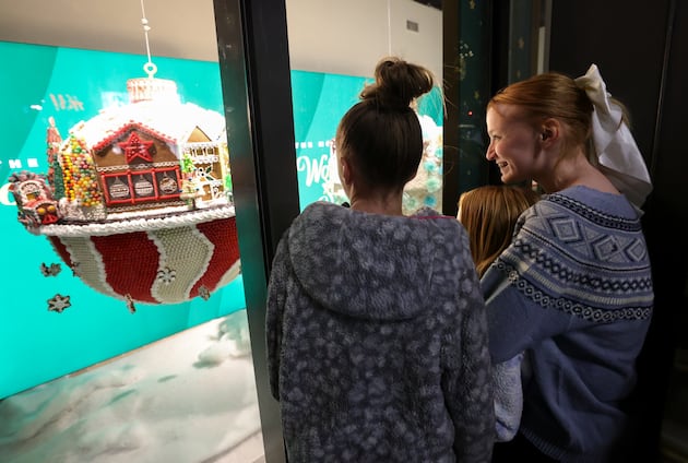 Photo gallery: Holiday festivities unfold in Salt Lake City with supersized candy window displays
