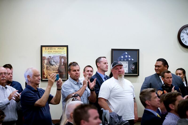 People applaud the announcement on Wednesday, May 30, 2018, that Facebook will build a nearly 1-million-square-foot data center in Eagle Mountain.