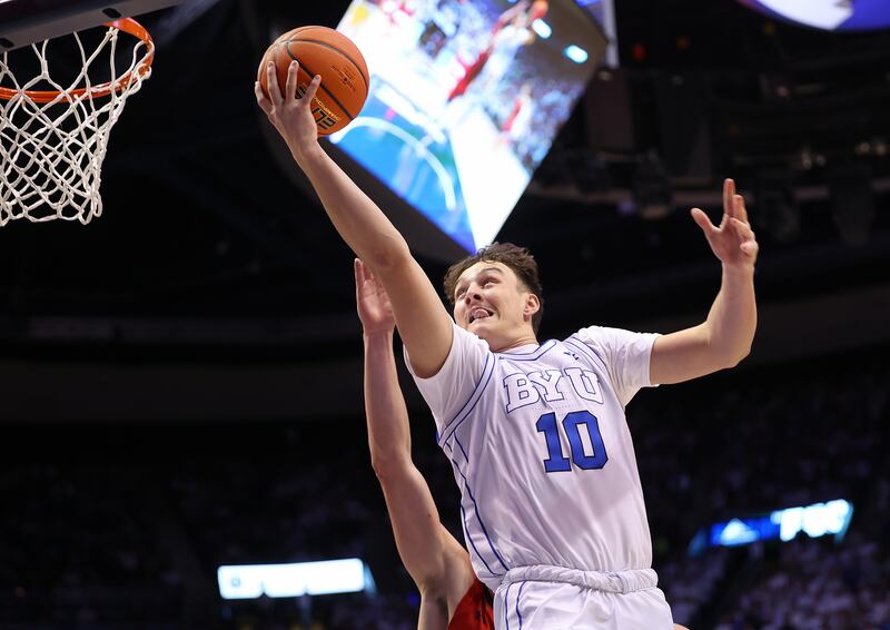 BYU forward Tredyn Christensen shoots during game against Saint Mary’s at the Marriott Center in Provo.