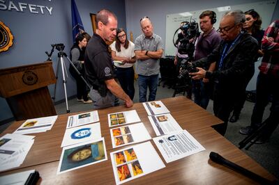 State Bureau of Investigation agent Brian Davis shows photos and other information pertaining a cold case homicide from April 1998 during a press conference in West Valley City on Tuesday, Oct. 2, 2018. Agents are asking for the public’s help in identifyi