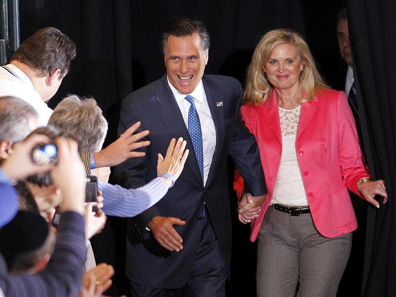 Republican presidential candidate, former Massachusetts Gov. Mitt Romney, and his wife Ann greet supporters as they arrive at their Super Tuesday primary night rally in Boston, Tuesday, March 6, 2012.