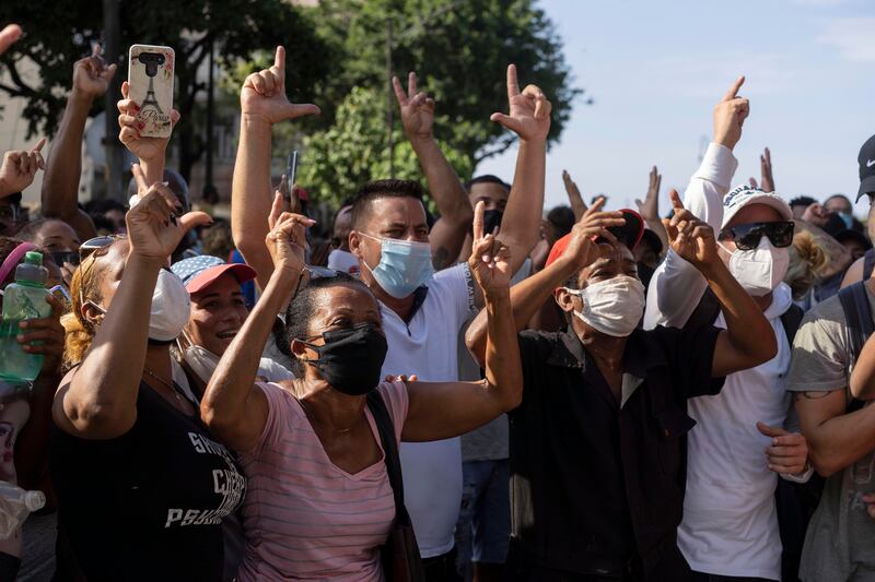Anti-government protesters march in Havana, Cuba, on Sunday, July 11, 2021.