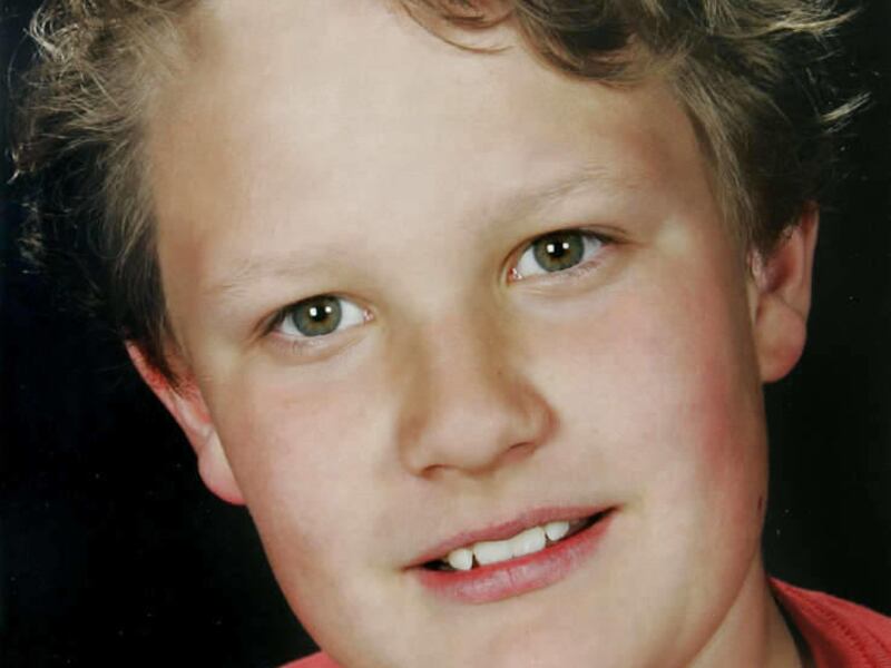 Samuel Ives poses his school portrait in March 2007 in a photo that was released by his family during a news conference June 19 2007.  The 11-year-old was dragged from his family's tent and killed by a black bear on a camping trip.