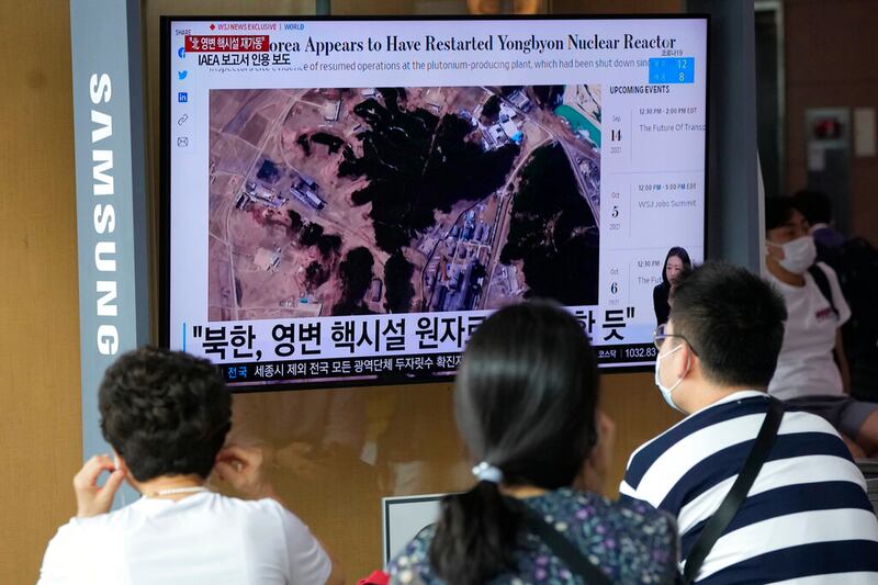 A TV screen showing a file satellite image of the Yongbyon nuclear site in North Korea.