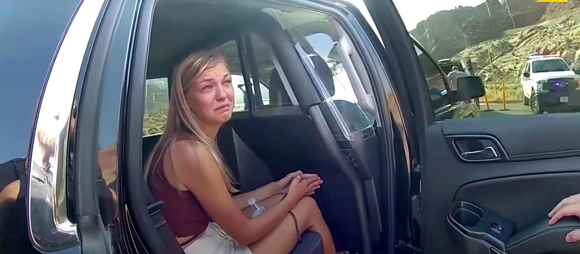 Body camera video shows Gabby Petito talking to a police officer after the van she was riding in was pulled over in Utah.