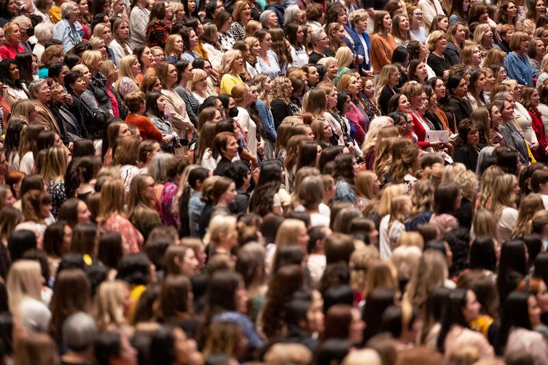 Women rise in song during the women’s session of the 192nd Annual General Conference of The Church of Jesus Christ of Latter-day Saints.