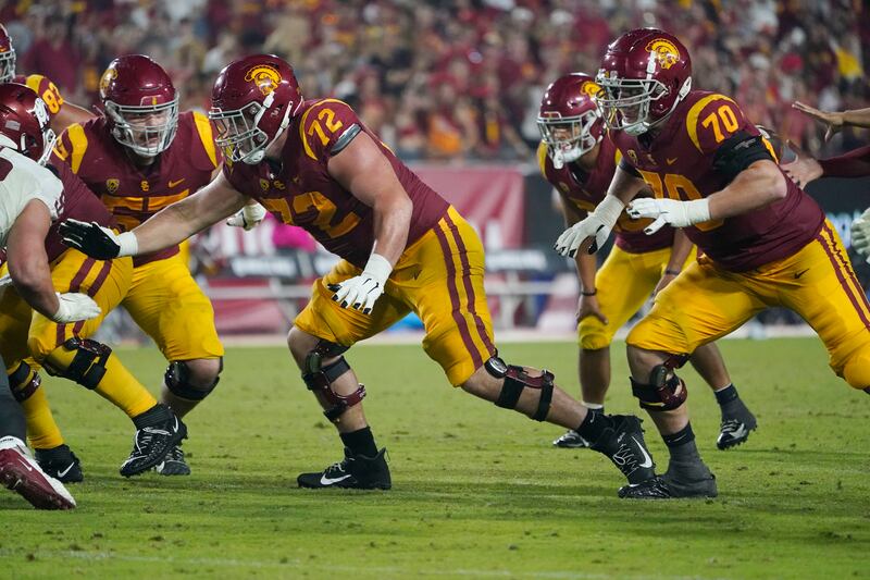 Southern California offensive linemen battle against Washington State during a game Saturday, Oct. 8, 2022, in Los Angeles.