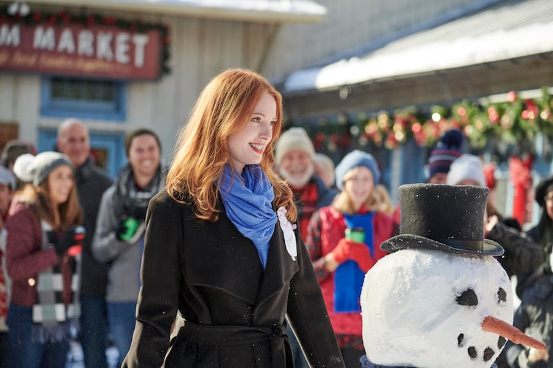 Emma (Alicia Witt) in the Hallmark Channel film “Christmas on Honeysuckle Lane.”