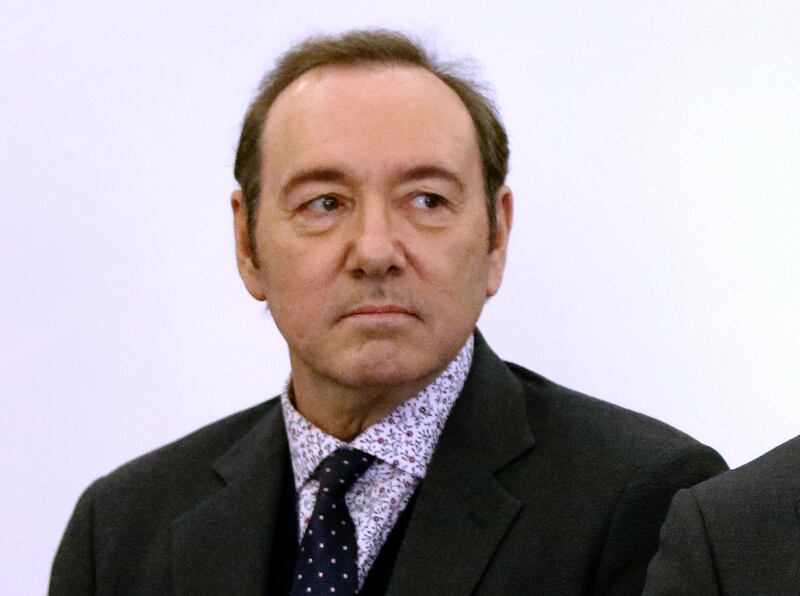 FILE - In this Jan. 7, 2019 file photo, actor Kevin Spacey stands in district court during arraignment on a charge of indecent assault and battery in Nantucket, Mass. Lawyers for Kevin Spacey are returning to court in the case accusing the former “House o