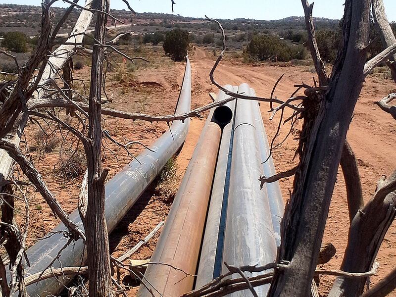 Sections of a pipeline that collects natural gas sit outside Dead Horse State Park near Moab.