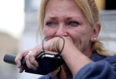 Beckey Cook gets emotional while talking about the Dollar Ridge Fire during an interview in Fruitland on Wednesday, July 11, 2018.