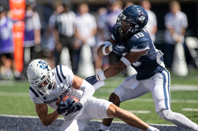 Utah State receiver Kyle Van Leeuwen makes a catch during game against Connecticut on Saturday, Aug., 27, 2022 in Logan, Utah.