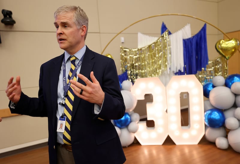Dr. Stephen McKellar, Intermountain Health Care Cardiovascular Department chairman and heart surgeon, answers interview questions during an event to celebrate Intermountain Artificial Heart Program’s 30 years Monday.