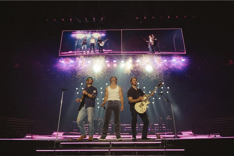 Jonas Brothers perform in front of a Utah crowd at the Maverik Center.