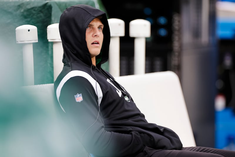 New York Jets quarterback Zach Wilson reacts during the second half of an NFL football game against the Cincinnati Bengals Sunday, Sept. 25, 2022, in East Rutherford, N.J. The Bengals won 27-12.