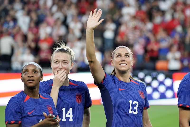 United States’ Alex Morgan waves to the crowd before an international friendly soccer match against South Africa on Sept. 21, 2023.