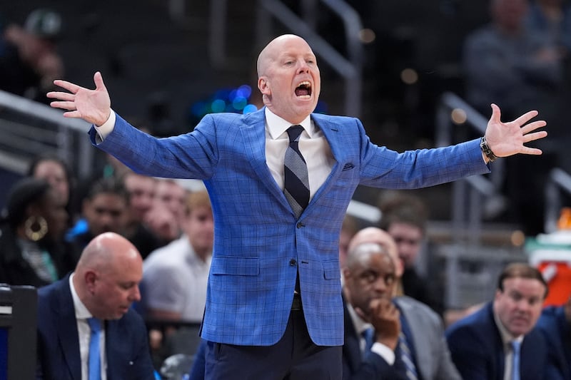 UCLA head coach Mick Cronin questions a call against Wisconsin during Big Ten quarterfinals game in Indianapolis, Friday, March 14, 2025.