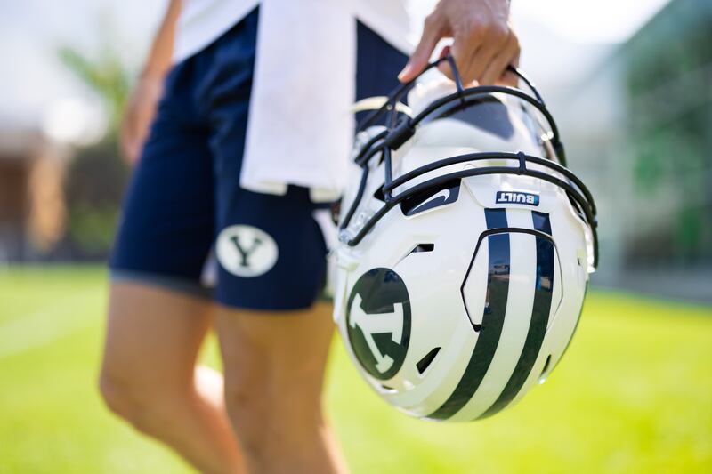 A Built logo can be seen on the helmet of a BYU player during fall camp in Provo, Utah.