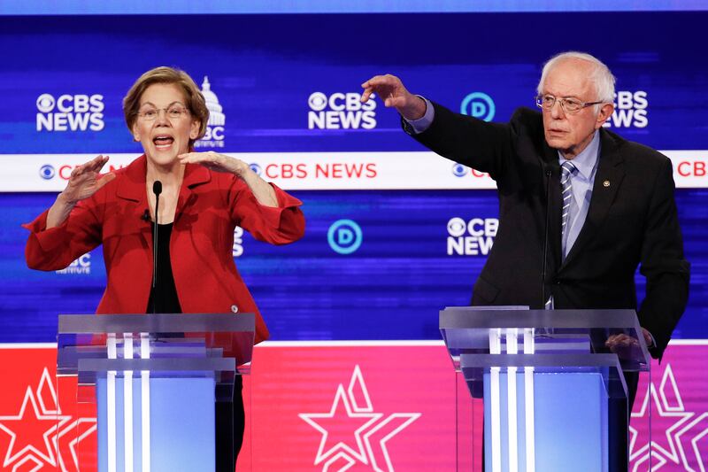Democratic presidential candidates, Sen. Elizabeth Warren, D-Mass., left, and Sen. Bernie Sanders, I-Vt., right, participate in a Democratic presidential primary debate at the Gaillard Center, Tuesday, Feb. 25, 2020, in Charleston, S.C., co-hosted by CBS News and the Congressional Black Caucus Institute.