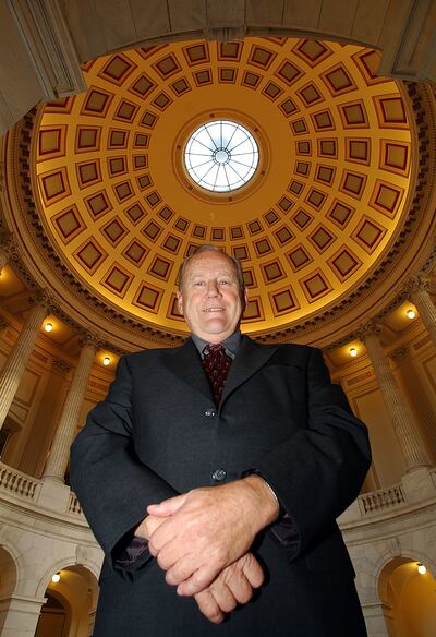 Rep. Jim Hansen, R-Utah, stand in Cannon House Office Building in Washington on Oct 16, 2002.