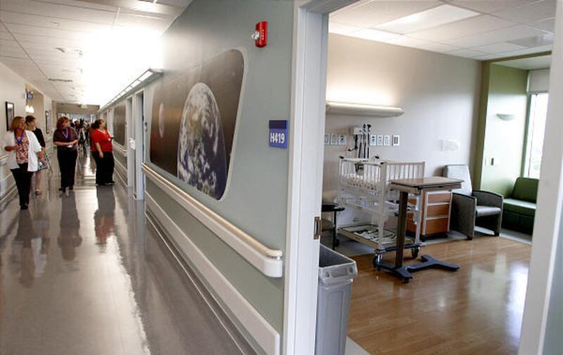 People tour the new children's unit at Riverton Hospital following a ribbon-cutting ceremony on Wednesday.