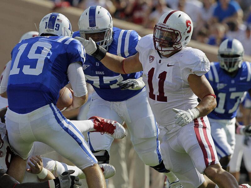 FILe - This Sept. 10, 2011 file photo shows Stanford's Shayne Skov (11) rushing Duke quarterback Sean Renfree (19) during the first half of an NCAA college football game in Durham, N.C. Linebacker and leading tackler Skov is out for the season with a left