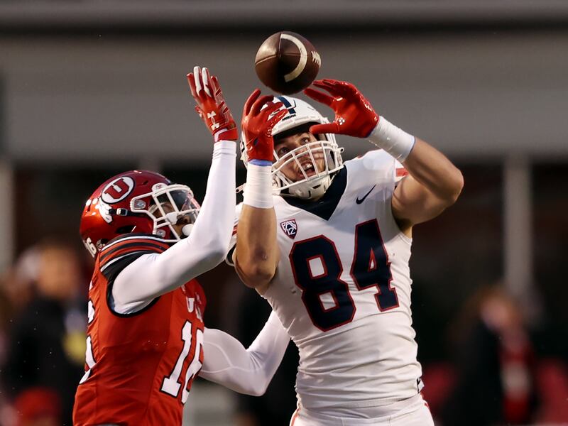 Utah cornerback Zemaiah Vaughn knocks the ball away from Arizona tight end Tanner McLachlan at Rice-Eccles Stadium.