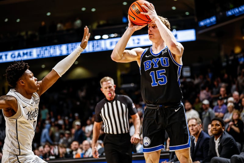BYU's Richie Saunders gets off a shot during victory over UCF Saturday afternoon in Orlando, Florida. Saunders led the Cougars with 22 points.