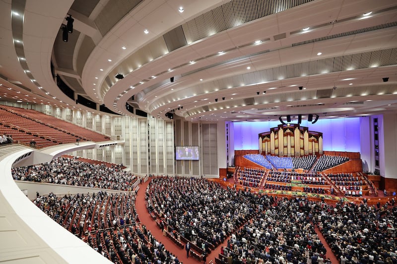 Attendees sing during a congregational hymn during the Sunday morning session of the 193rd Annual General Conference of The Church of Jesus Christ of Latter-day Saints.