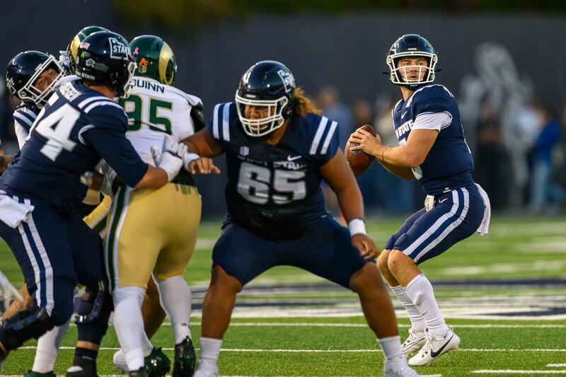 Utah State quarterback Cooper Legas looks to throwduring an NCAA football game on Saturday, Oct. 7, 2023 in Logan, Utah.