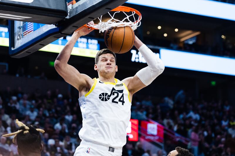 Utah Jazz center Utah Jazz center Walker Kessler dunks the ball during a game at Vivint Arena Kessler dunks the ball.