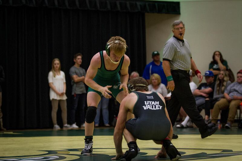 Utah Valley freshman Taylor LaMont (green singlet) grapples with teammate Jarod Maynes (black singlet) at the UVU Intrasquad Dual on Oct. 29, 2016. LaMont is one of 14 Wolverines slated to take part at Saturday's UVU Open tournament.