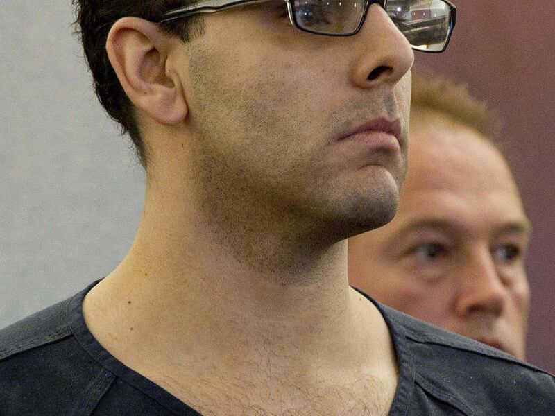 FILE - In this April 8, 2011 file photo, Anthony Carleo, 30, listens in district court in Las Vegas. Carleo, who admitted to holding up the posh Bellagio resort on the Las Vegas Strip of $1.5 million in casino chips, is scheduled to be sentenced Tuesday,
