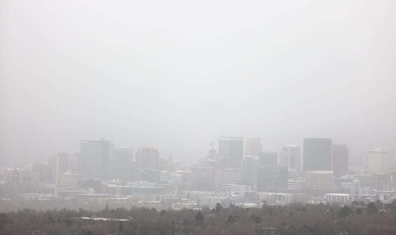Visibility is limited as dust blows over Salt Lake City during a windstorm on April 18, 2023.